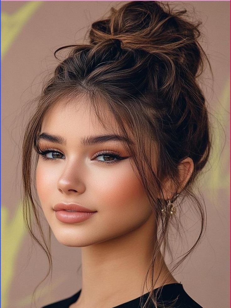 the messy top knot hairstyle 